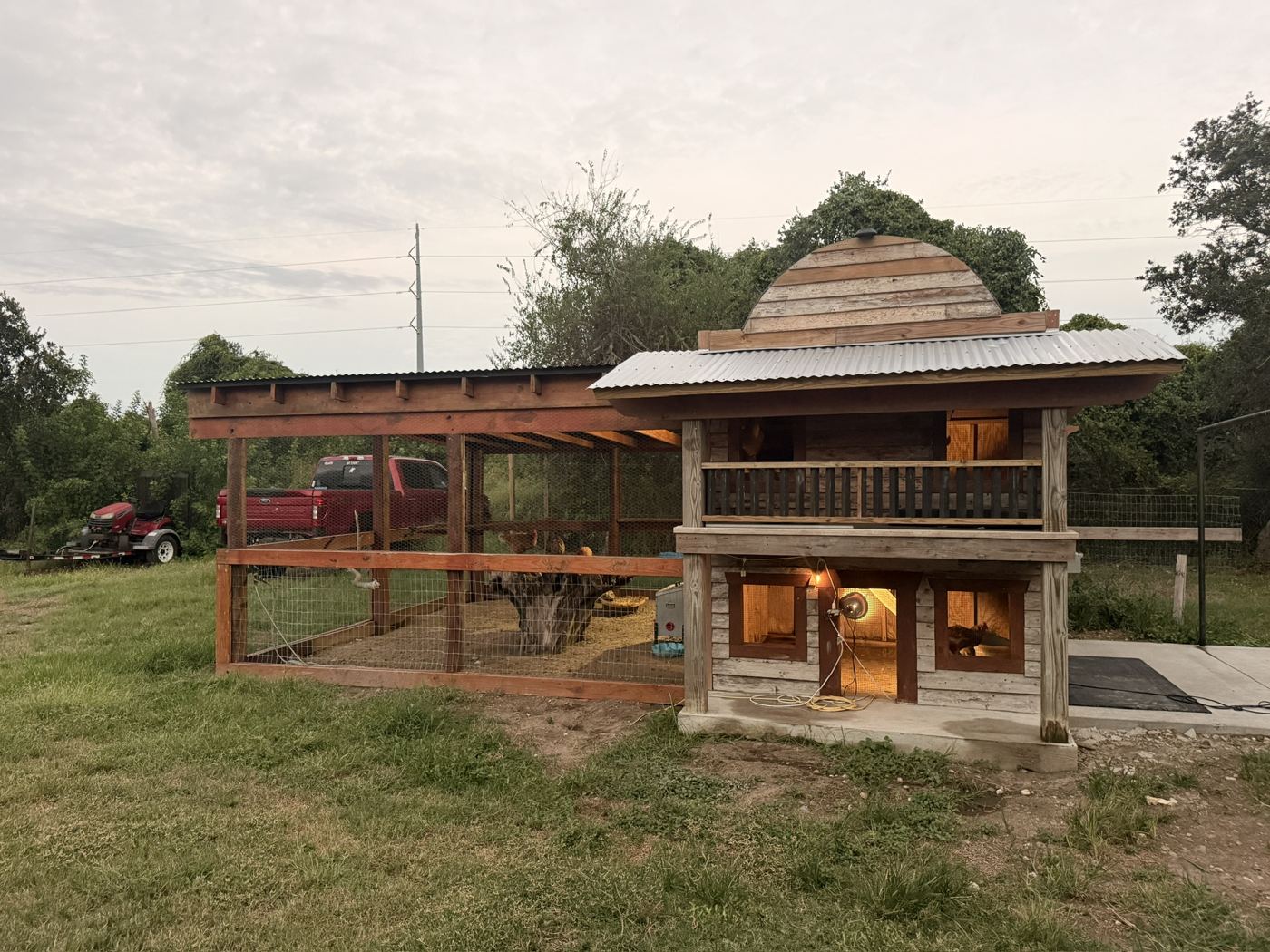 The saloon-style chicken coop at dusk