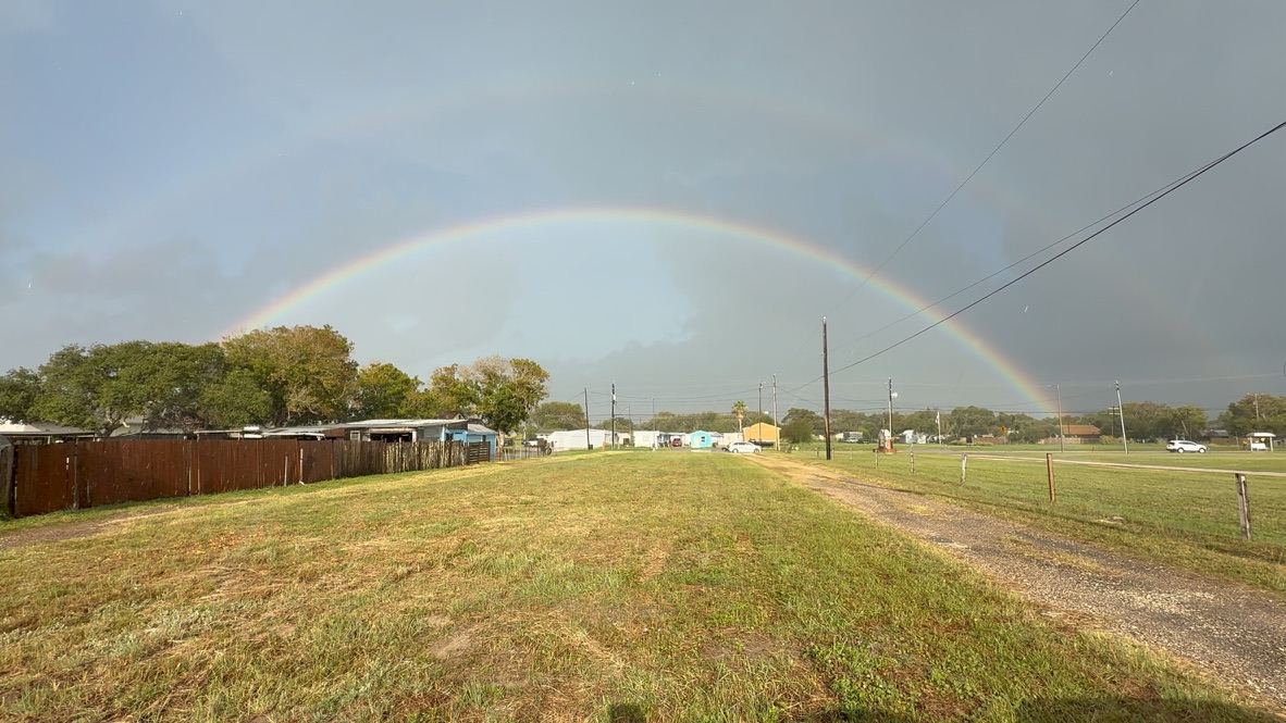 The lot under a double rainbow